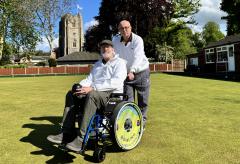 Lawn bowls club obtain wheelchair for use on bowling greens